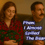 Abby rests serenely on the couch in red poinsettia pajamas, cradling a blanket-wrapped Teddy while Gary stares off toward the TV, tense and distracted. The caption reads, “Phew. I Almost Spilled The Beans.”
