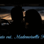 Seen from the back seat at night, two silhouetted adults sit in the front of a Bronco as it drives along a divided rural road; the woman in the passenger seat leans toward the driver to whisper in his ear, with snow-lined countryside visible through the windshield.